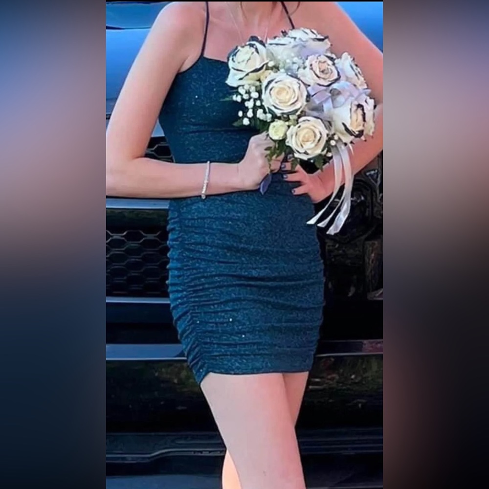 Blueish greenish  homecoming dress. Worn to try on and to dance. Good condition